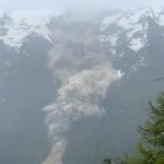 Mud and rock buries evacuated Swiss village after glacier collapse, one person missing