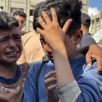 Dozens of Palestinians killed near Gaza aid distribution point, health officials say, in third day of shooting