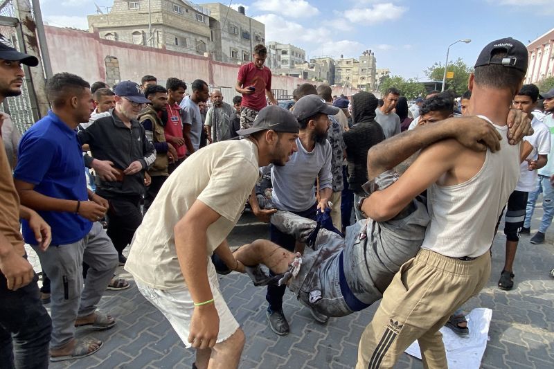 Dozens killed by Israeli fire as they sought desperately needed aid in Gaza, Palestinian health ministry says